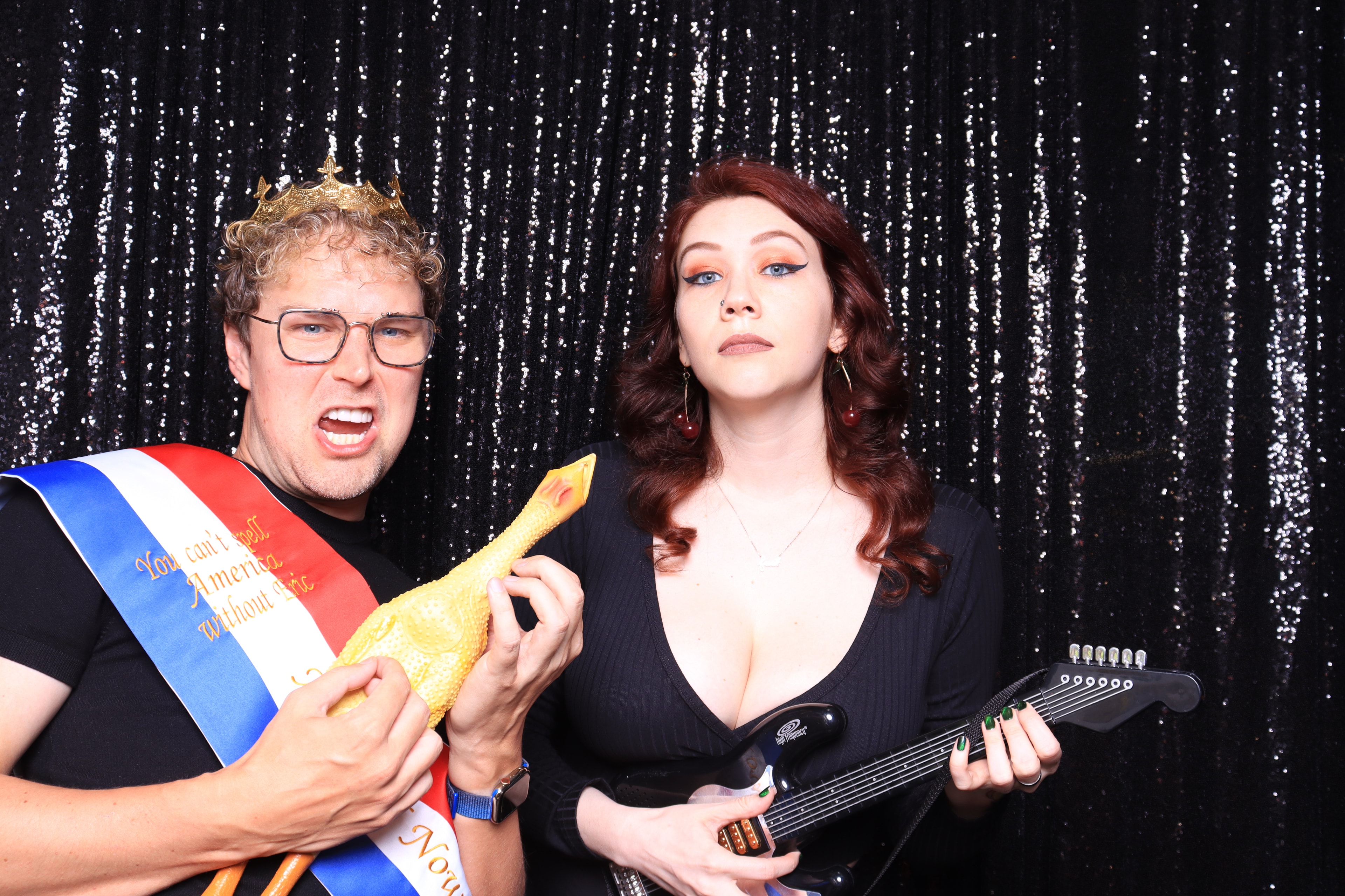 Fun costume party photo booth with props and sequin backdrop